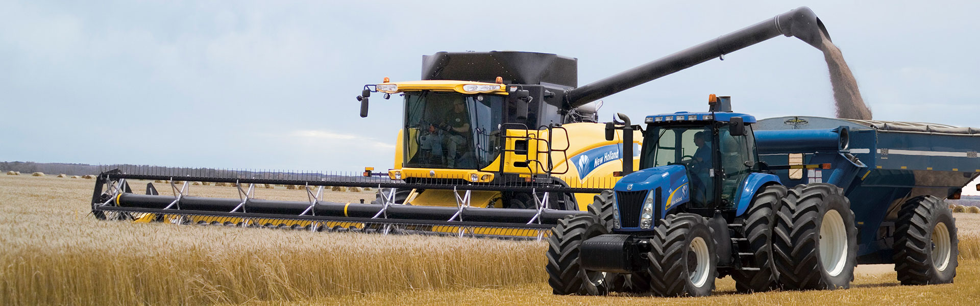 New Holland combine and tractor